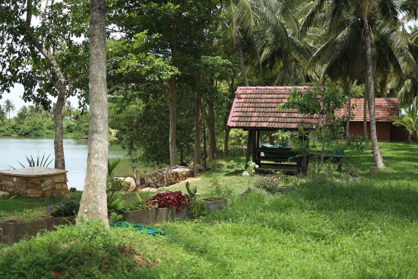 Fifteen-acre tropical fruit farm beside the lake — Aji Fruit Farm, Embilipitiya, near Udawalawe National Park, Sri Lanka
